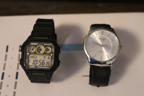 Two of my watches, a Casio on the left, and an Omax on the right